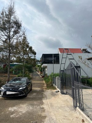 bán đất tặng nhà tại tt bảo lộc, 597 m2, chính chủ, điện nước đấy đủ