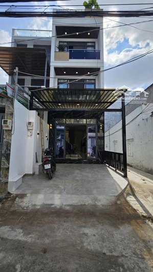 nhà 4 tầng thiết kế hiện đại 4x16 sổ hồng riêng hổ trợ vay