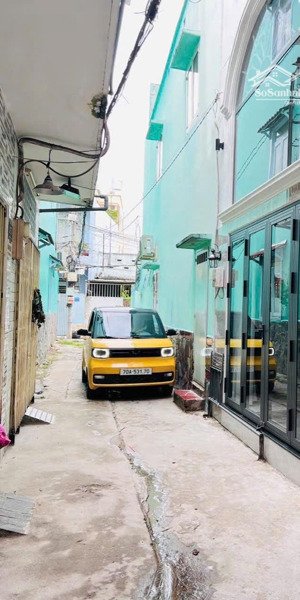 nhà 2 tầng xây mới - hẻm xe hơi - có nguồn thu cho thuê sẵn 8tr/ tháng