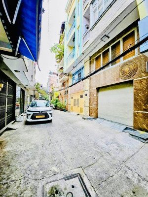 nhà mặt tiền đường số - ngang 4.5m vuông đẹp phường 4, quận 4 4 tầng hoàn công đủ