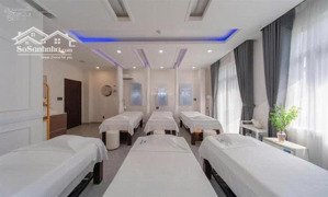 bán tòa nhà 9 tầng phố nghĩa tân thang máy hầm ô tô kinh doanh sầm uất