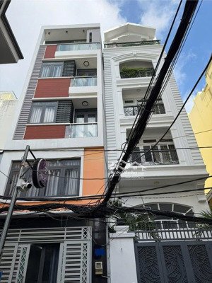 bán toà nhà 135m2, khu vip phan xích long, 7 tầng, cho thuê 120/th, zalo/sdt: 