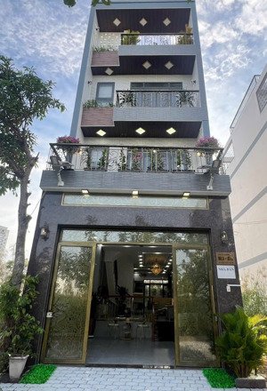 nhà phố mới 100% có thang máy đường huỳnh tấn phát , nhà 4 lầu giá 9.2 tỷ