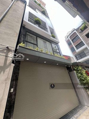 bán nhà đường hồ đắc di lõi đống đa 10m ra phố vị trí cực đẹp 6 tầng thang máy 4.8m mặt tiền bề thế