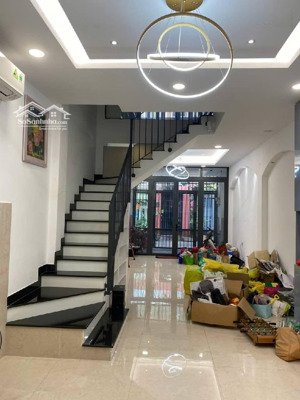 bán nhà mới 4 tầng xe hơi vào nhà ngay mặt tiền đường số phường tân quy,full nội thất,giá 10 tỷ x