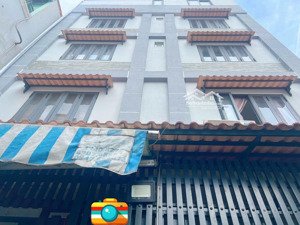 nhà 5 tầng kiên cố tôn đản q.4