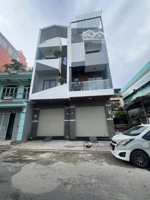 nhà đẹp mới xây 4 tấm mt đường 16m khu họ lê. dt:4.2x13m. giá: 8.9 tỷ