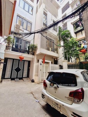 bán nhà nguyễn văn huyên - 40m2 * 6 tầng thang máy * lô góc - ô tô đỗ cửa - 12,5 tỷ - lh 