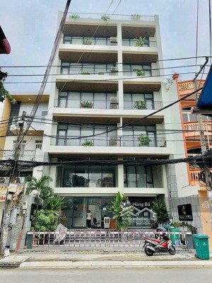 bán gấp ! tòa nhà góc 2 mặt tiền hà huy giáp - dt: 19 x 29m - 7 tầng - hđt: 230 tr. giá chỉ 55 tỷ