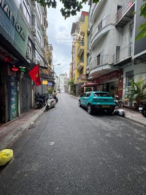 ngõ thông phong - đống đa - ô tô tránh - kinh doanh thang máy - dt 93m2 x 6 tầng mt 3.6m giá 26 tỷ