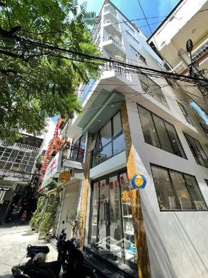 bán nhà tôn đức thắng đống đa. lô góc 2 mặt thoáng, sân rộng trước nhà đỗ chục ô tô. kinh doanh tốt