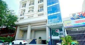 bán nhà mặt phố ngọc khánh, dt 120m2 x 9 tầng, mặt tiền 9m, thuê 200 tr/ th.