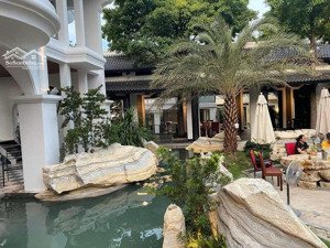 mt dương quảng hàm 5.525m2 tổ hợp cà phê, nhà hàng đang kinh doanh, ngang 48m kv xây dựng 14 tầng.