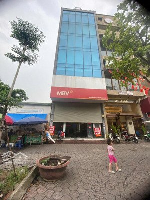 cho thuê nhà vũ phạm hàm , dt 160m, 7 tầng, mt7m, thông sàn, thang máy, 160tr/tháng