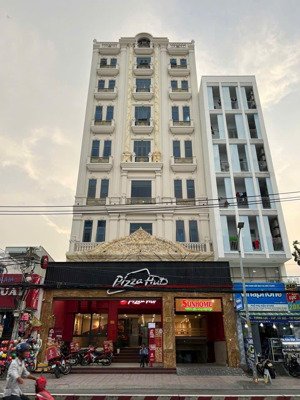 bán tòa nhà mt huỳnh tấn phát q7 hầm 10 tầng 195tytl