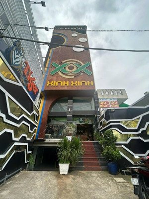 bán tòa nhà karaoke mt huỳnh tấn phát q7 8x23m hầm 7 tầng giá 51ty tl