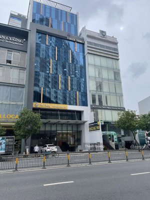 bán tòa nhà mặt tiền quang trung - dt: 20x30m - hầm 8 tầng - hđt: 450tr/tháng - giá 59.5 tỷ tl