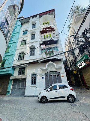 bán nhà lô góc phố pháo đài láng - ô tô ngủ nhà - dt 50m2 x 5 tầng - mt 8.8m - giá 20,5 tỷ.