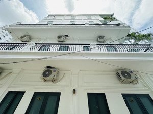 bán nhà 5 tầng cực đẹp có thang máy 7,3x14m - 30 phòng - góc 2mt - quận tân phú - thu nhập 170tr/t