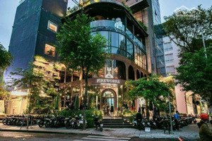 đối diện ks new world - mt phạm hồng thái, p. bt, q1 - dt 8 x 18m - 3 tầng - hđt 180tr - giá 80 tỷ