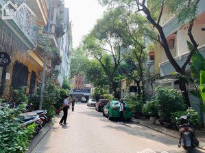 cần bán nhà mặt ngõ phố giảng võ quận đống đa.dt 52m2 x 7 tầng , ngõ rộng ô tô đỗ có thang máy