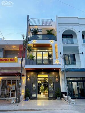 Nhà 1 trệt 2 lầu xây mới hiện đại đường D7 Khu Dân Cư Hồng Loan