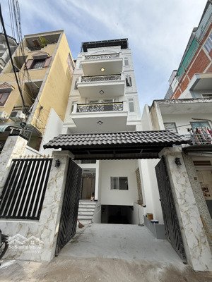 nhà mặt tiền khủng 7 tầng thang máy khu vip đường số tân quy quận 7.