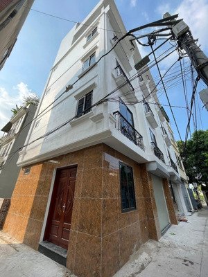 đội cấn - 50m2 - 6 tầng - lô góc - 2 mặt ngõ - thang máy- nhỉnh 8 tỷ - cách phố 30m