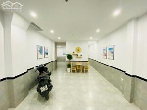 Bán nhà Phan Văn Trường 65m2, 7T, MT 4.6m, ngõ ôto, gara, 18 tỷ