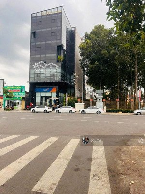 siêu phẩm toà nhà 2 hầm 9 tầng góc 2 mặt tiền ngay trục nguyễn văn trỗi tn 850tr/th giá 205 tỷ