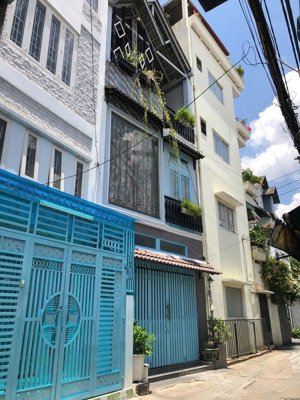 bán nhà hẻm xe hơi gần mặt tiền lê quang định, dt 4.6x12m, nở hậu 5m, 4 lầu, 4pn, giá 10.5 tỷ tl