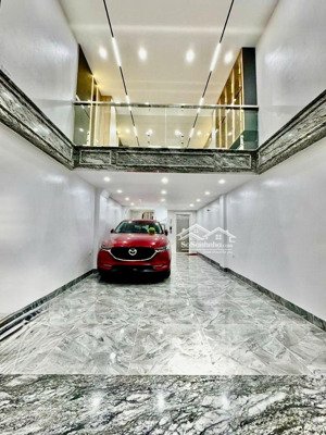 nhà lô góc ô tô trong nhà mặt tiền đẹp kinh doanh cực tốt 5 tầng ở ngay