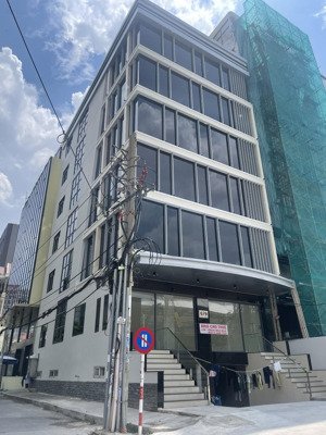 tòa nhà hầm 8 tầng - hđt 230 triệu mt nơ trang long, bình thạnh. dt 10x28. (1150m2 sàn). gía 68 tỷ