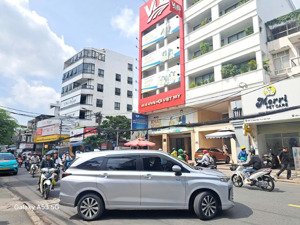 bán toà nhà hầm 7 tầng mặt tiền đường lê quang định 9x30m(1800m2 sàn), đang cho vus thuê 350tr/th