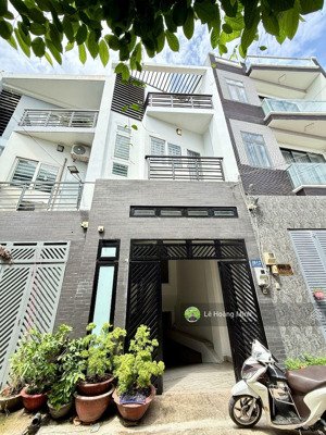 nhà phố 1 hầm 3 lầu 1/ hẻm 6m đường tân thới hiệp 08