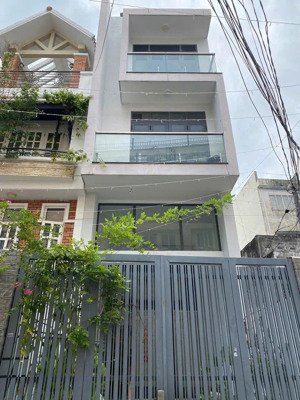 tòa nhà 7 tầng thang máy - 10 phòng - sát quận 1 - lê văn duyệt - bình thạnh