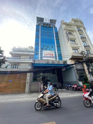 tòa nhà mặt tiền phổ quang, q.tân bình - dt: 11x25m - hầm 7 tầng - hđt: 300 triệu - giá: 65 tỷ