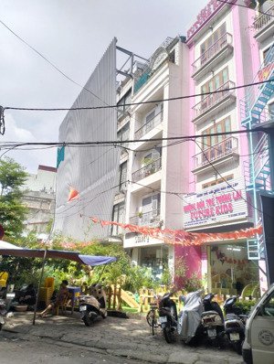 hồ đắc di - trần hữu tước - tây sơn - trung tâm - nhà 7 tầng mới xây - thang máy - 1 nhà ra mặt phố