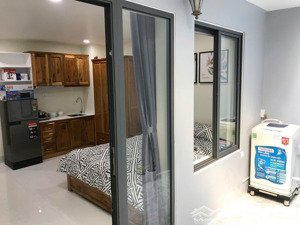 cho thuê căn trệt studio rộng ban công thang máy giặt riêng full nt mới ngay trần hưng đạo quận 1