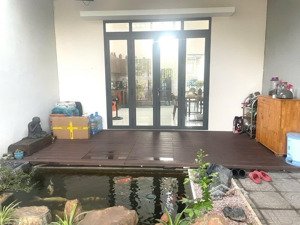 bán nhà thành phố mới trệt lửng 2pn- có hồ cá koi, sân xe hơi rộng, nhà đối diện công viên 3,1ty