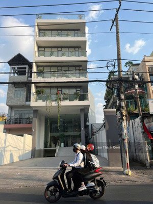 bán nhà mt tân kỳ tân quý, 9x70, 1 hầm, 4 lầu, st, đang cho thuê 350tr/t, 99 tỷ