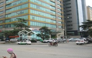 bán tòa văn phòng duy tân, 165m2, 9 tầng, mặt tiền 10m, 2 ô tô tránh, doanh thu 2.4 tỷ/năm
