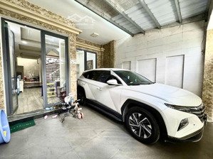 nhà 3 tầng mới tinh xe hơi ngủ trong nhà tặng nội thất xịn sò 95m2 đường thông 10m