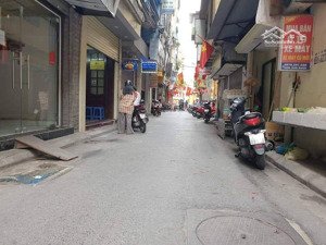 bán nhà thái thịnh ôtô 7 chỗ qua nhà - vào nhà - 7 tầng - ngõ thông 25m ra mp thái thịnh 12.8 tỷ