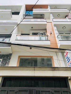 nhà phố đồng bộ hẻm xe hơi quang trung - 4x15m- 5 tầng - cần bán gấp