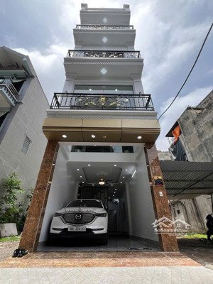 siêu phẩm đông mỹ 60m 4 tầng thang máy - ô tô đi qua - kinh doanh . xem là ưng .