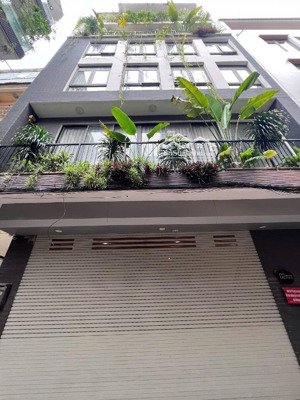 phố hoàng cầu - lô góc - gara oto - nhà dân xây 7 tầng thang máy