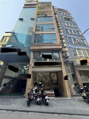 toà văn phòng thái thịnh - mặt phố vỉa hè 4 oto tránh - building 9 tầng thang máy