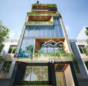 bán tòa chdv- văn phòng ngay trần hưng đạo, sát cầu rồng, 100m2 mt 7m x 7 tầng dòng tiền 100tr/th