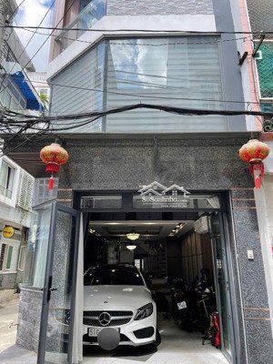 nhà đẹp 5 tầng góc 2mt nguyễn bặc xe hơi vào nhà full nội thất